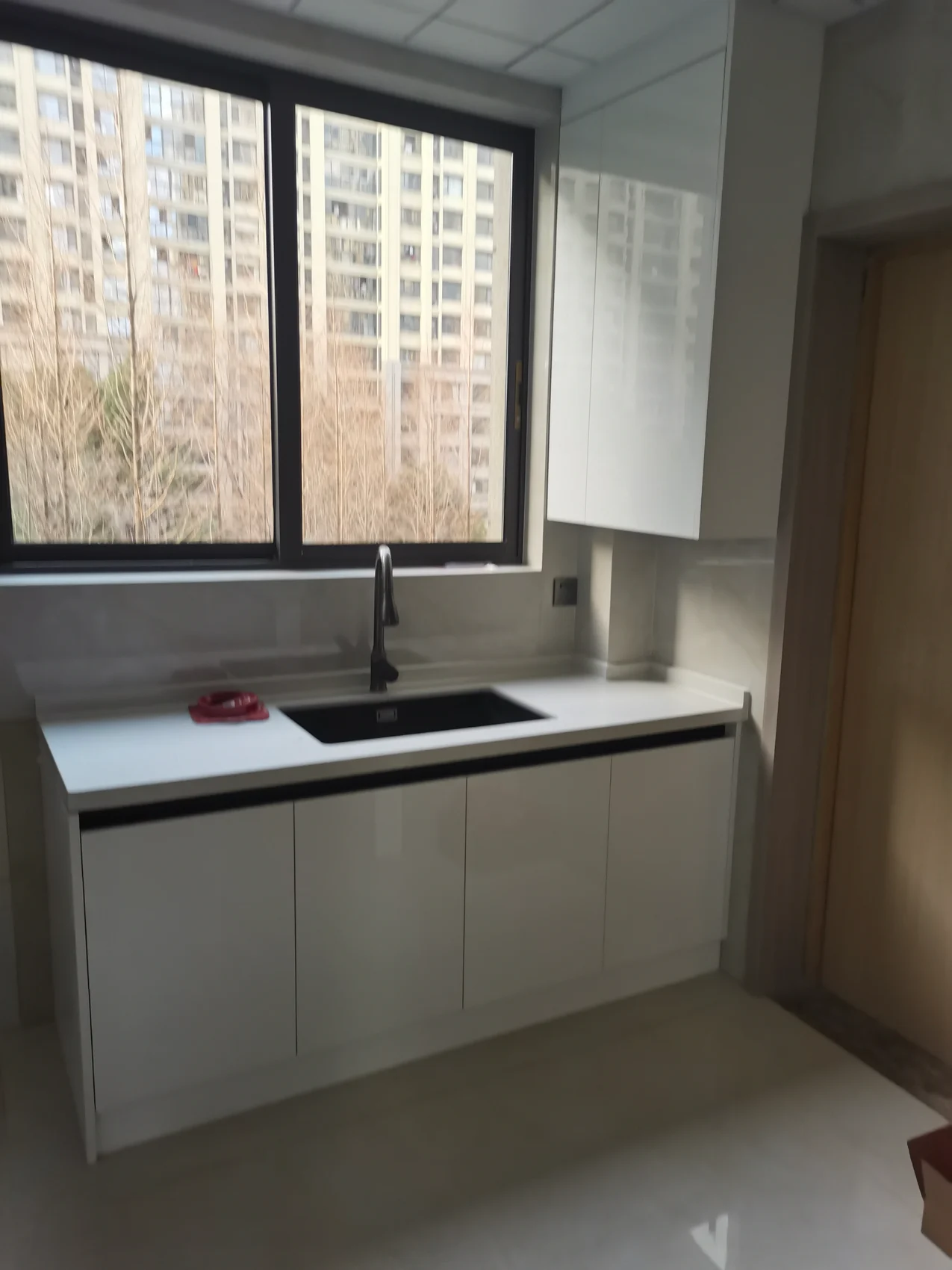 Sunlit Apartment Kitchen Renewal — archive view 2